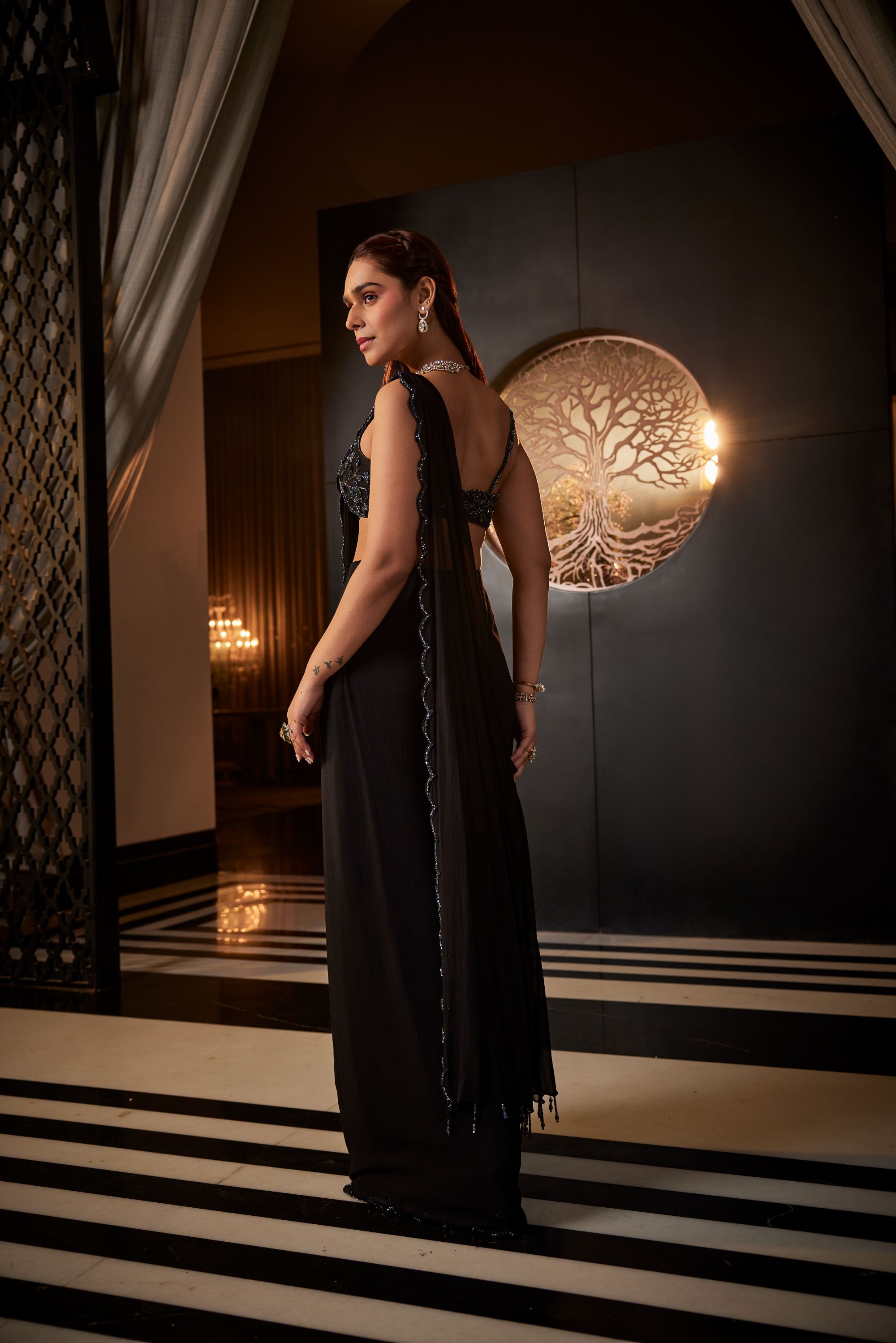Timeless black scalloped georgette saree set